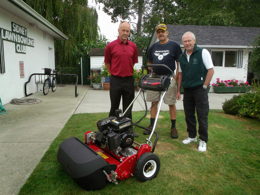 Sidney Lawn Bowling Club  - Taking care of the green.